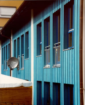 Reihenhausbebauung Waldram Gartenfassade